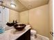 Stylish bathroom with vessel sink and dark vanity at 4005 Paul Robarts Ct, Las Vegas, NV 89102