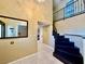 Bright entryway, featuring a mirror and staircase at 4005 Paul Robarts Ct, Las Vegas, NV 89102