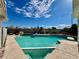 Large backyard pool with a slide and ample deck space at 4005 Paul Robarts Ct, Las Vegas, NV 89102