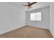 Spacious bedroom with ceiling fan and neutral walls at 10596 Corte Sierra St, Las Vegas, NV 89183