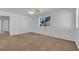 Well-lit bedroom with a window and ceiling fan at 10596 Corte Sierra St, Las Vegas, NV 89183