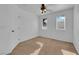 Bright bedroom with carpet flooring and ceiling fan at 10596 Corte Sierra St, Las Vegas, NV 89183