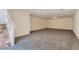 Large basement area with carpeted floor at 4327 Melrose Abbey Pl, Las Vegas, NV 89141