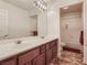 Well-appointed bathroom with double sinks and shower/tub combo at 4327 Melrose Abbey Pl, Las Vegas, NV 89141