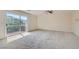 Spacious bedroom with balcony access and mountain views at 4327 Melrose Abbey Pl, Las Vegas, NV 89141
