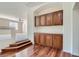 Built-in wooden cabinets offer extra storage space at 4327 Melrose Abbey Pl, Las Vegas, NV 89141