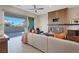 Spacious living room featuring a fireplace and sliding glass doors to a patio at 120 Los Cabos Dr # 301, Las Vegas, NV 89144