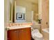 Clean bathroom with a toilet, sink, and bathtub at 2877 Paradise Rd # 104, Las Vegas, NV 89109