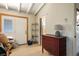Entryway featuring tile floors, a closet door and a vintage dresser at 16 Cerrito St, Blue Diamond, NV 89004