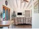 Inviting living room featuring beamed ceilings and cozy decor at 16 Cerrito St, Blue Diamond, NV 89004