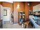 Well-lit home office with a desk, a white chair, and neutral-colored walls at 16 Cerrito St, Blue Diamond, NV 89004