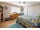 Spacious bedroom with light blue bedding and ample closet space at 5413 Lochmor Ave, Las Vegas, NV 89130