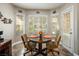 Bright breakfast nook with bay window and table for three at 5413 Lochmor Ave, Las Vegas, NV 89130