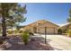 Charming single-story home with well-manicured landscaping and a welcoming front porch at 5413 Lochmor Ave, Las Vegas, NV 89130