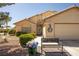 Two-story home with attractive landscaping and a welcoming front entry at 5413 Lochmor Ave, Las Vegas, NV 89130