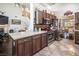 Modern kitchen featuring stainless steel appliances and dark wood cabinets at 5413 Lochmor Ave, Las Vegas, NV 89130