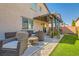 Comfortable outdoor space with patio furniture and privacy at 6322 Highledge St, North Las Vegas, NV 89081