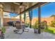 Outdoor living space with patio furniture and privacy at 6322 Highledge St, North Las Vegas, NV 89081