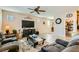 Inviting living room featuring hardwood floors and bright windows at 6322 Highledge St, North Las Vegas, NV 89081