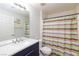 Clean bathroom with a shower/tub and colorful shower curtain at 5855 Valley Dr # 1028, North Las Vegas, NV 89031