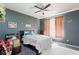 Spacious bedroom with a queen bed and gray walls at 5855 Valley Dr # 1028, North Las Vegas, NV 89031