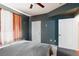 Serene bedroom with a queen bed and gray walls at 5855 Valley Dr # 1028, North Las Vegas, NV 89031