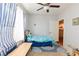 Charming bedroom with a twin bed and a ceiling fan at 5855 Valley Dr # 1028, North Las Vegas, NV 89031
