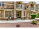 Tan two-story building with private entrance and balcony at 5855 Valley Dr # 1028, North Las Vegas, NV 89031