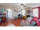 Spacious living room with hardwood floors, fireplace, and ample natural light at 5855 Valley Dr # 1028, North Las Vegas, NV 89031