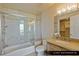 Guest bathroom with a glass-enclosed shower, vanity, and view at 9101 Alta Dr # 1202, Las Vegas, NV 89145