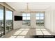 Guest bedroom with large windows, balcony, and chandelier at 9101 Alta Dr # 1202, Las Vegas, NV 89145