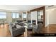 Bright living room with hardwood floors, modern fireplace and views from large windows at 9101 Alta Dr # 1202, Las Vegas, NV 89145