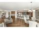 Open-concept living space with a kitchen featuring stainless steel appliances and a dining area at 9101 Alta Dr # 1202, Las Vegas, NV 89145