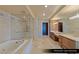 Beautiful primary bathroom with soaking tub, walk-in shower and double sink vanity at 9101 Alta Dr # 1202, Las Vegas, NV 89145