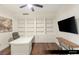 Bright office with custom built-ins, modern desk, hardwood floors, and sleek design at 9101 Alta Dr # 1202, Las Vegas, NV 89145