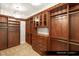 A spacious primary closet with custom wood shelves and plenty of storage space at 9101 Alta Dr # 1202, Las Vegas, NV 89145