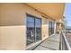 Private balcony with sliding glass doors, offering views of the surrounding area at 8255 Las Vegas Blvd # 1819, Las Vegas, NV 89123