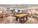 Relaxing game room with pool table, comfortable seating, and a wet bar at 8255 Las Vegas Blvd # 1819, Las Vegas, NV 89123