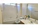 This bathroom has a shower, a sink and a toilet at 9809 Miss Peach Ave, Las Vegas, NV 89145