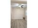 Neutral bedroom featuring a ceiling fan and shuttered window at 9809 Miss Peach Ave, Las Vegas, NV 89145