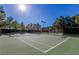 Community tennis court with professionally maintained surface and net at 9809 Miss Peach Ave, Las Vegas, NV 89145