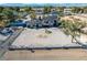 Spacious property with modern home, gravel yard, solar panels, mountain views, and decorative front turf at 7135 Polaris Ave, Las Vegas, NV 89118