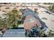 Aerial view showcasing the expansive desert property with solar panels and green accents at 7135 Polaris Ave, Las Vegas, NV 89118