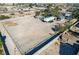 Expansive lot featuring high fencing, space for boat and RV parking, and possibilities for your dream project at 7135 Polaris Ave, Las Vegas, NV 89118