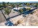 Expansive view of the modern home featuring desert landscaping and solar panels at 7135 Polaris Ave, Las Vegas, NV 89118