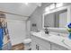 Bathroom featuring a shower/tub combo and vanity with marble countertops at 7135 Polaris Ave, Las Vegas, NV 89118