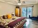 Bedroom featuring sliding glass doors to the backyard and a wooden wardrobe at 7135 Polaris Ave, Las Vegas, NV 89118