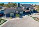 Exterior view of a charming home with solar panels and manicured front yard at 7135 Polaris Ave, Las Vegas, NV 89118