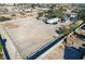 Expansive vacant lot with RV/boat parking, enclosed by a perimeter wall, offering versatile potential at 7135 Polaris Ave, Las Vegas, NV 89118