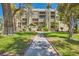 Beautiful building exterior with trees and grass at 750 S Royal Crest Cir # 353, Las Vegas, NV 89169